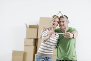 Young couple moving in new home